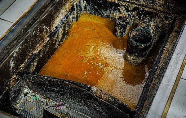 grease trap cleaning helps prevent grease and oil from entering the sewer system, thus reducing the risk of ecological contamination